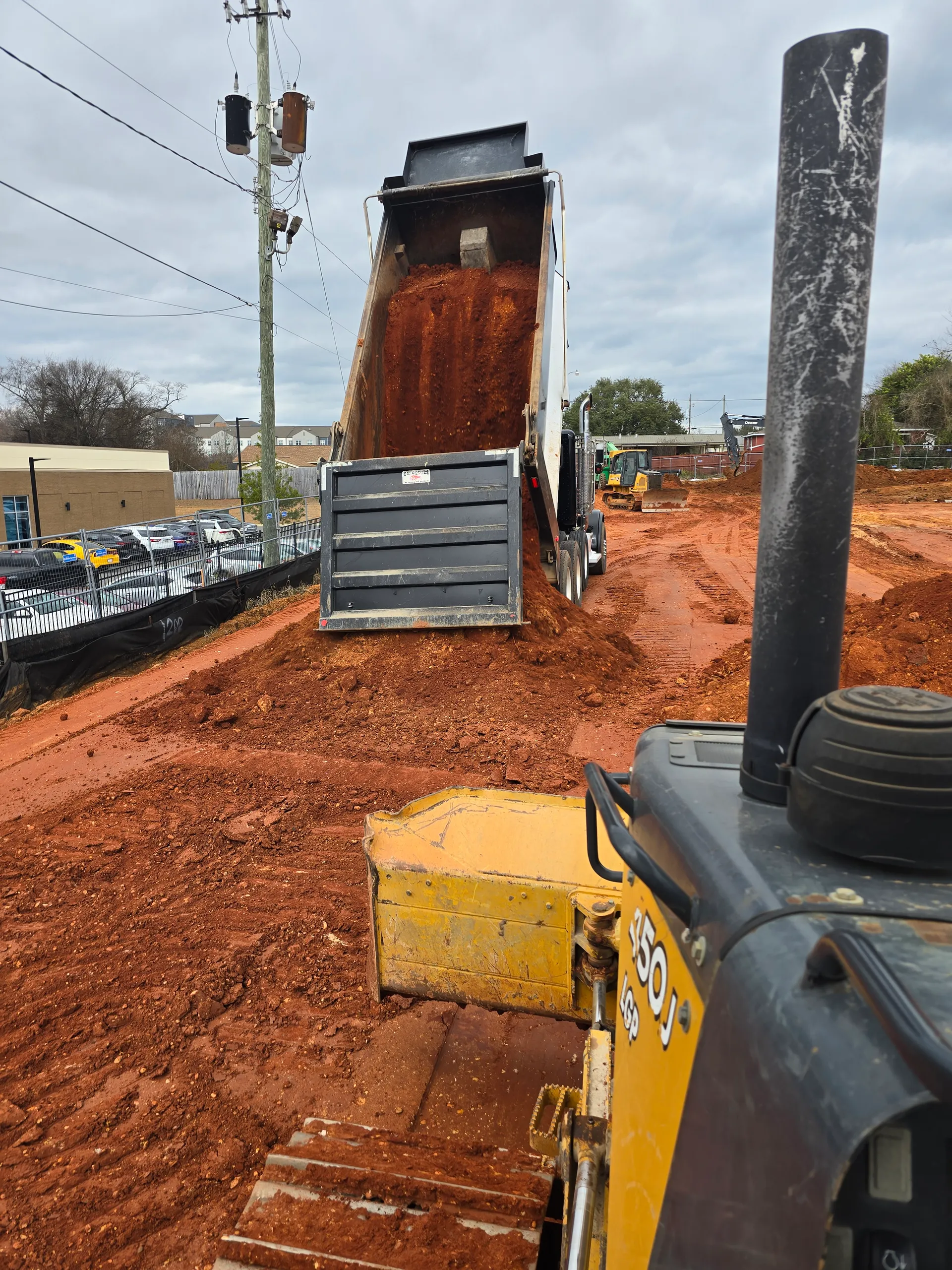 Construction vehicles working on a site