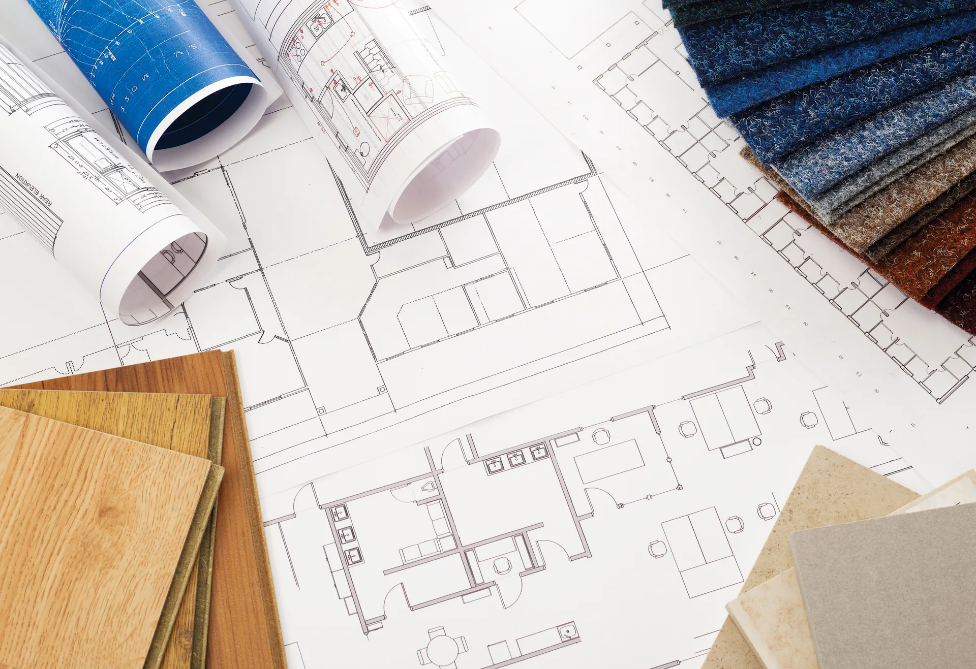 Architectural drawings and material samples for a design-build project