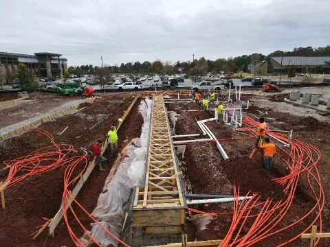 Construction crew preparing a commercial site